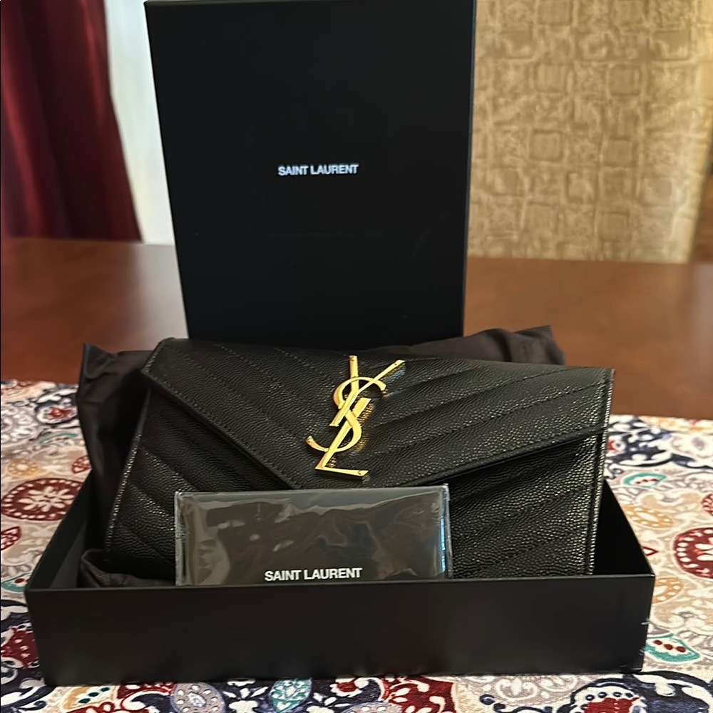 Saint Laurent Quilted Black Clutch with Gold Monogram